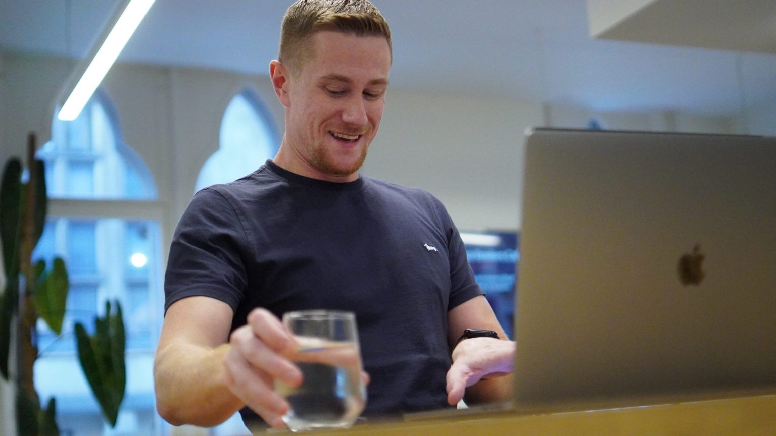 jack Mason working from Laptop